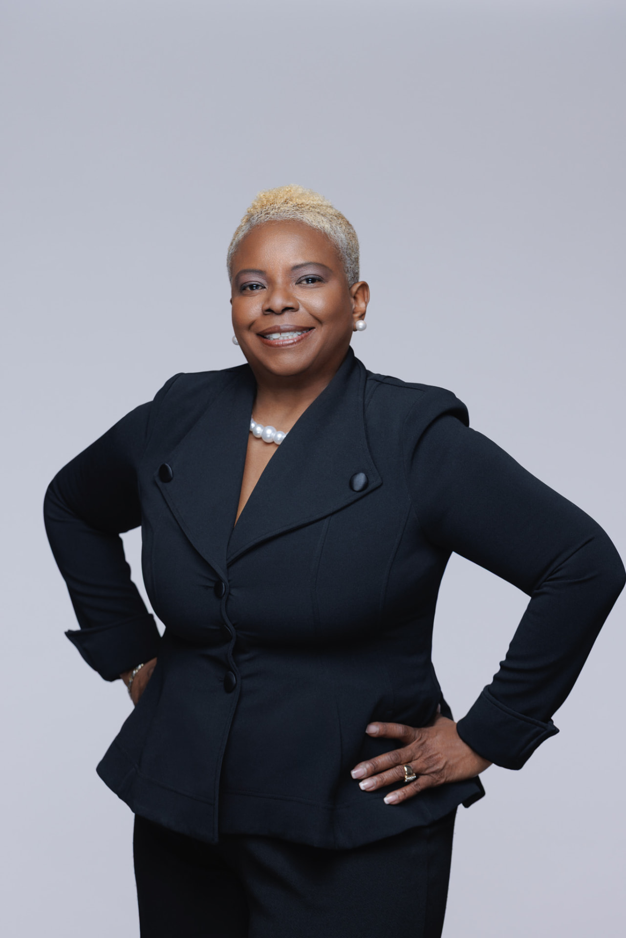 Robben Washington standing with her hands on her hips